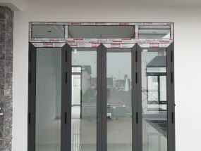 NHÔM KÍNH TRẢNG BOM